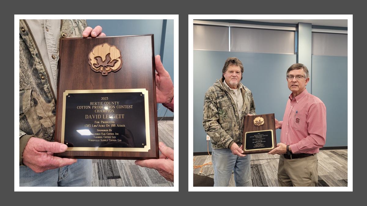 A man presented with a plaque for cotton production.