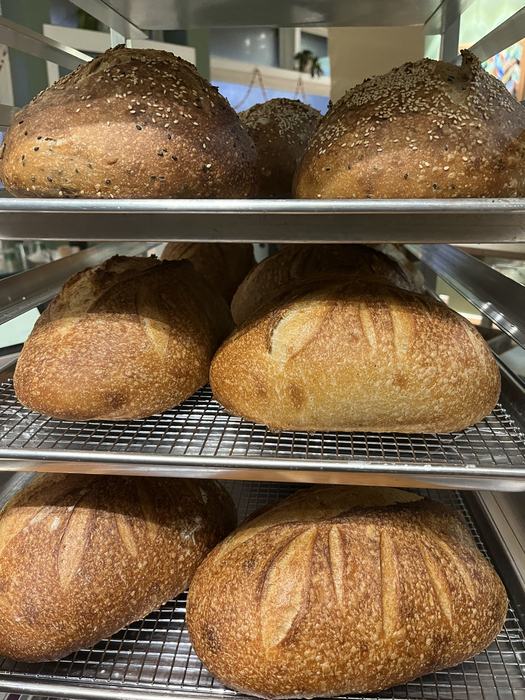 Baked bread on cooling racks.