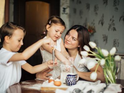 mother and children at table