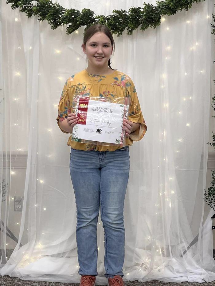 Autumn Pendry receiving her awards for her record book.