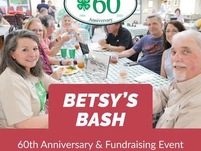 Betsy's bash group of people enjoying dinner at the event