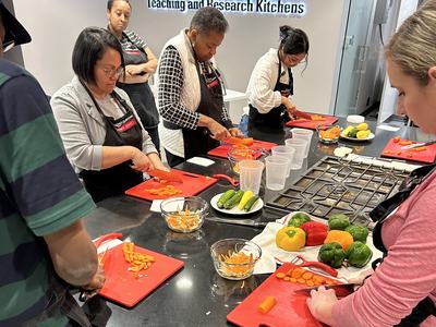 staff cutting vegetables