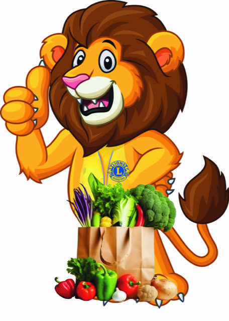 Cartoon lion in Lions Club jacket giving thumbs-up beside a grocery bag of vegetables