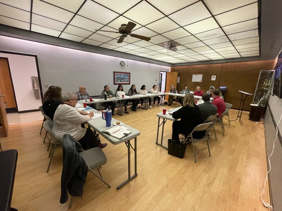 Advisory Leadership members in a meeting