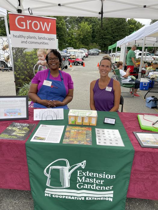 Extension Master Gardener Volunteers at a booth.