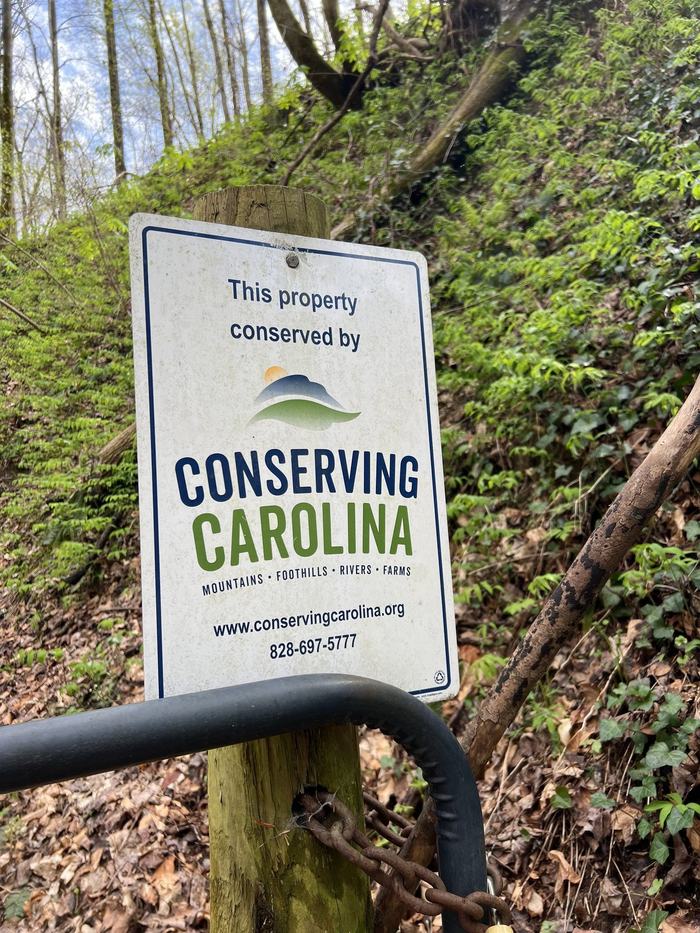 Conserving Carolina sign on a post.