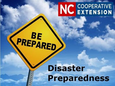 Yellow sign BE PREPARED; NC Cooperative Extension logo; Disaster Preparedness text
