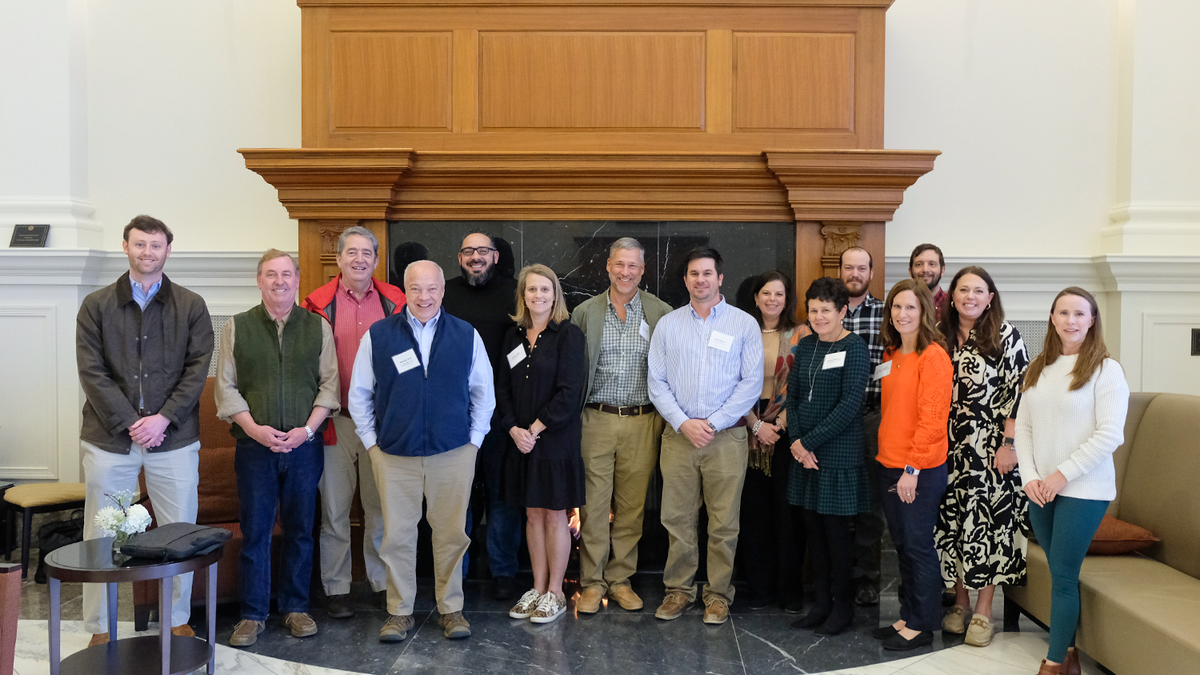 A group of people participating at the alumni summit.