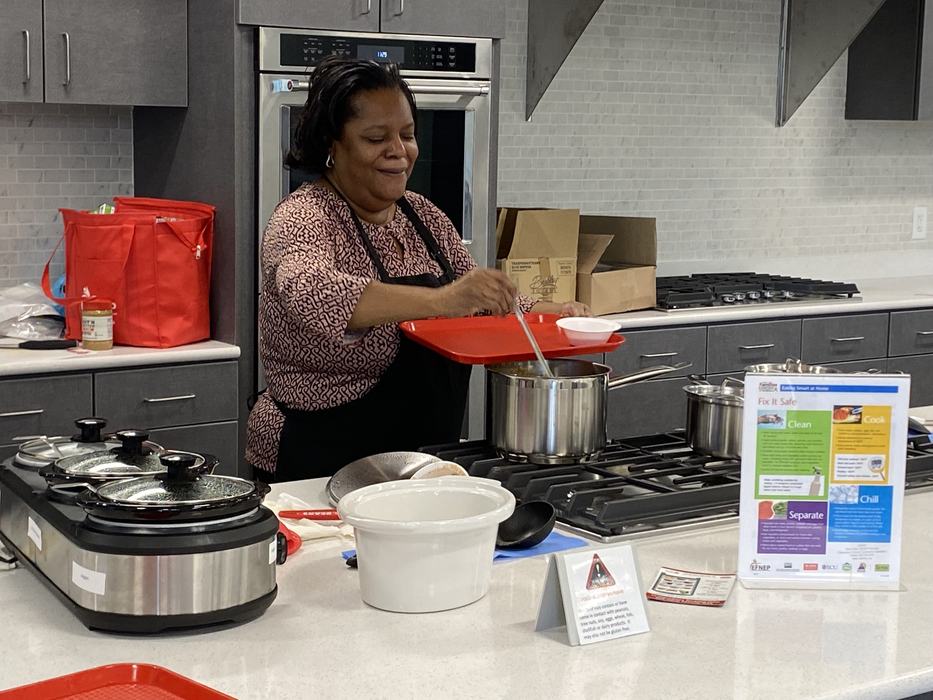 Della Cooking at Foodbank