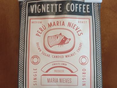 Vignette Coffee bag labeled "Perú Maria Nieves" and "Made in Greensboro"