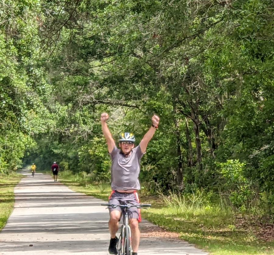guy riding his bike hands-free