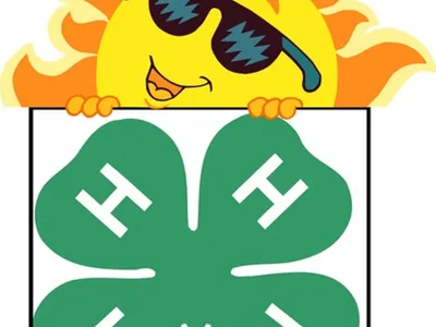 4-H clover with smiling sun
