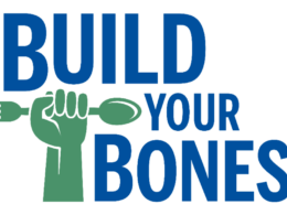 Green fist holding a fork and spoon with blue text "BUILD YOUR BONES!"