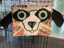 2D Model of a dog with ears and big eyes