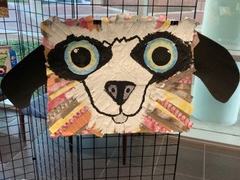 2D Model of a dog with ears and big eyes