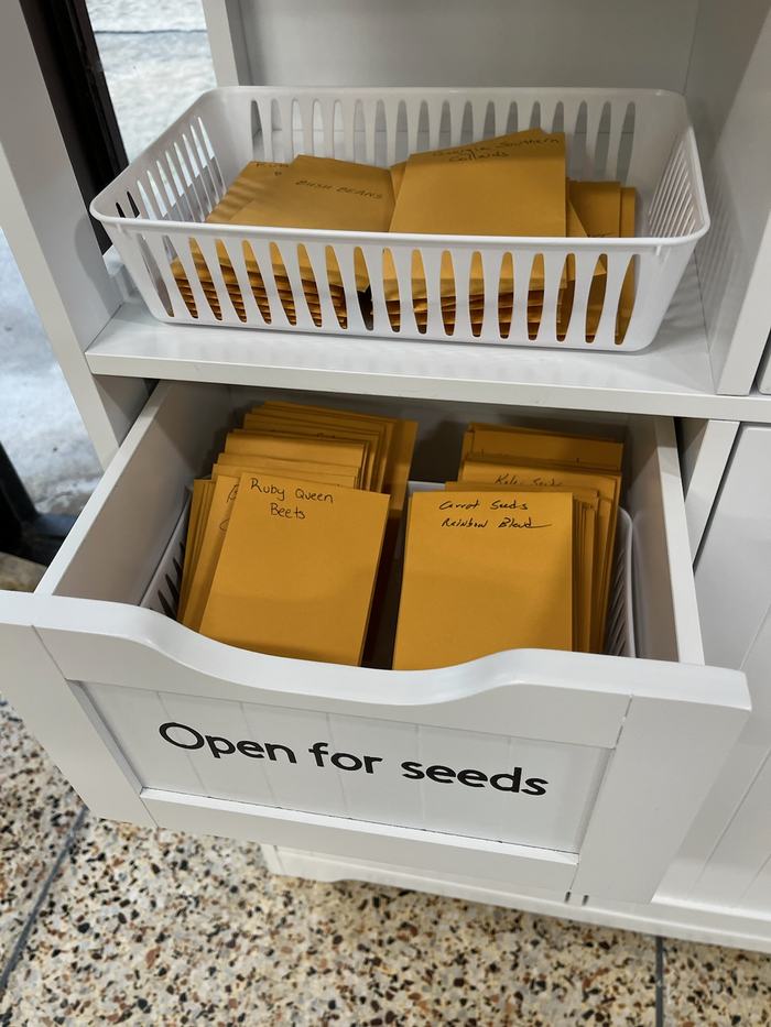 Seed packs in a drawer.