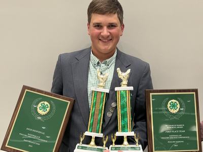 Matthew Peluso with his 4-H National Awards in Poultry Judging
