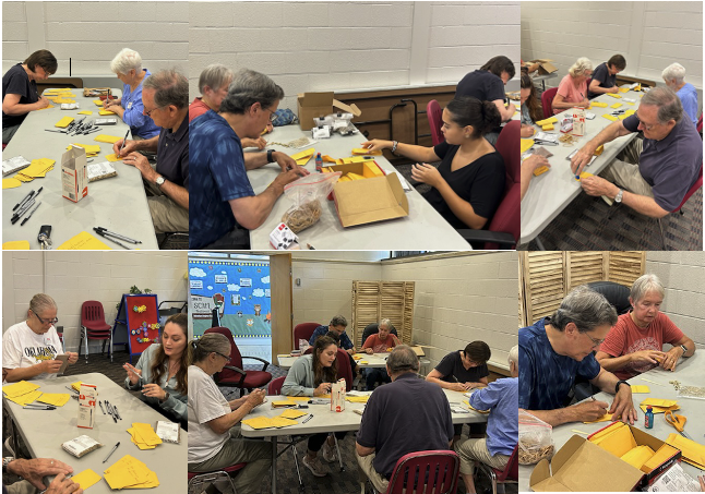 Volunteers work to create custom seed packets.