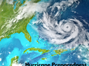 Satellite view of Atlantic hurricane near southeastern U.S. with text "Hurricane Preparedness"