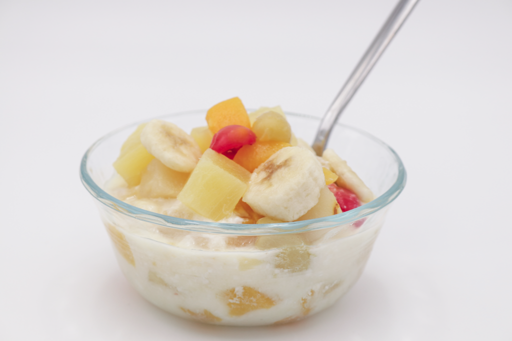 EFNEP Easy Fruit Salad recipe in a bowl with a spoon