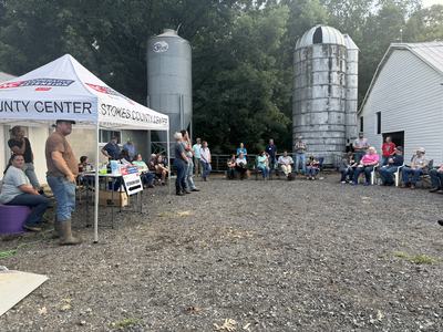 Field Day photo with a tent that says NC Cooperative Extension