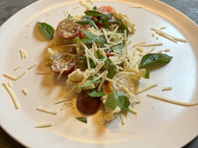 tomato and pasta on plate