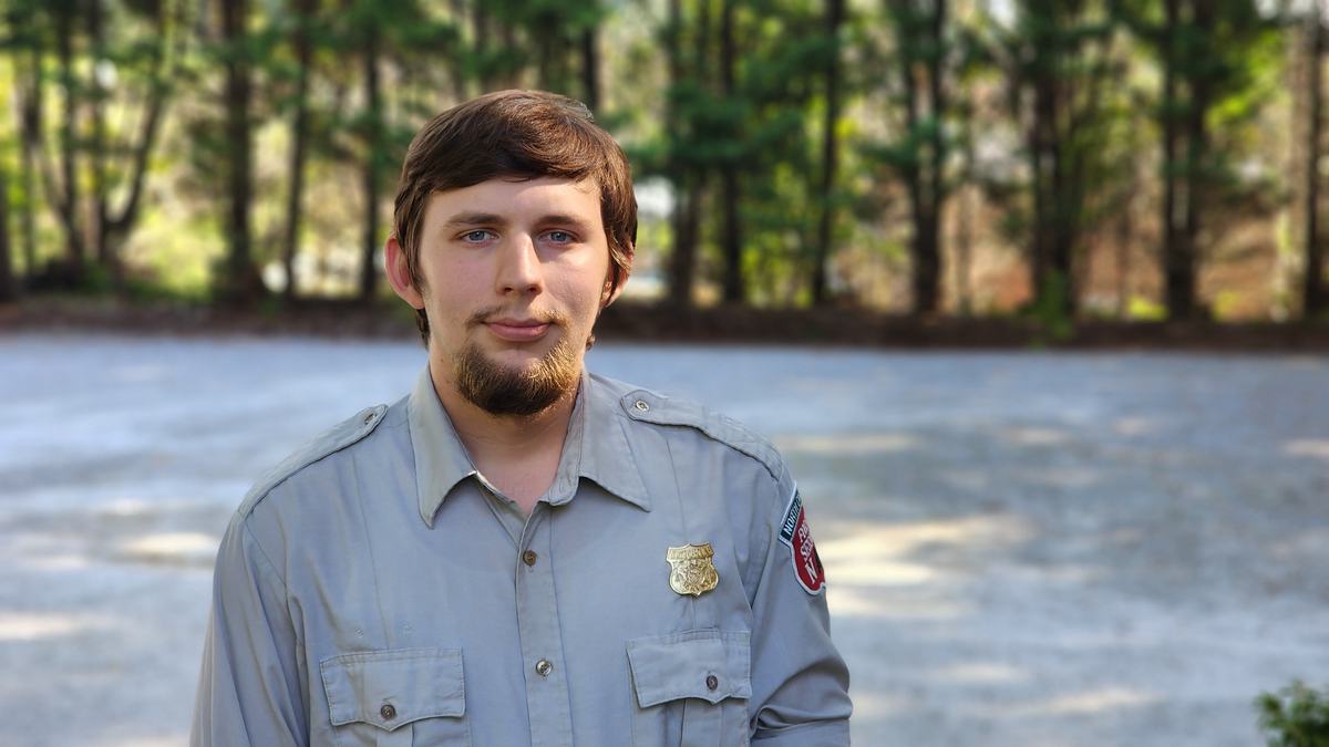 A man in a forester uniform.