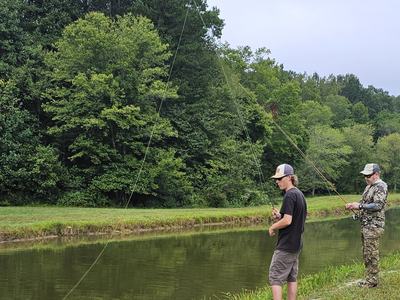 Zeke Rogers and Greg Charles fishing