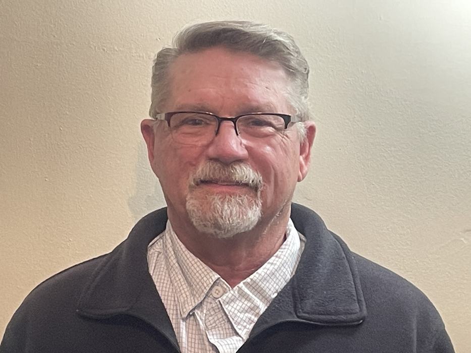 Professional headshot of Mac Prescott, a member of the Pamlico Advisory Council.