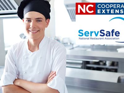 Chef in white coat and black hat in kitchen; text: "NC Cooperative Extension" and "ServSafe."
