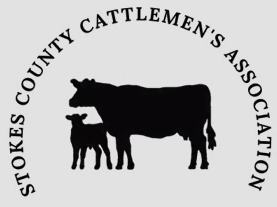 A black cow with a black calf in front of her under the words Stokes County Cattlemen's Association