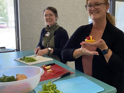 staff preparing peppers