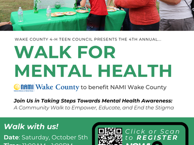 People at a table and a poster reading "WALK FOR MENTAL HEALTH" — Oct 5, 11AM-1PM, Lake Crabtree
