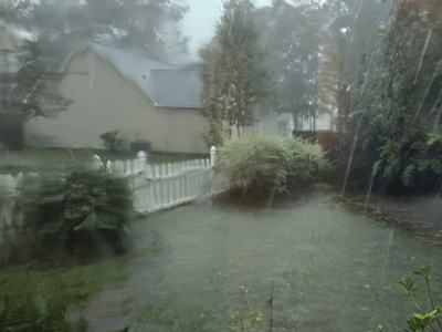 Flooding in a backyard.