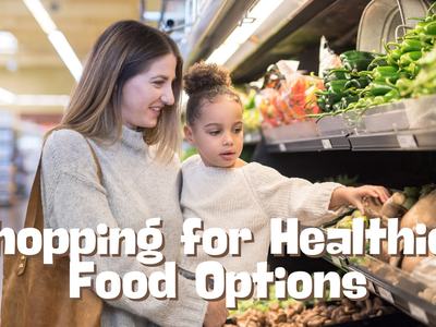Woman and child shopping for produce