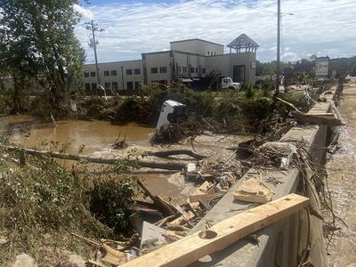 Submerged van in the Swannanoa River near Biltmore Village after Hurricane Helene in Asheville, N.C.