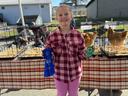 Poultry Show Contest Winner with Blue Ribbon