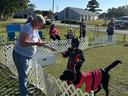Luke Morris and his canine companion, Scout receiving their 2nd place ribbon