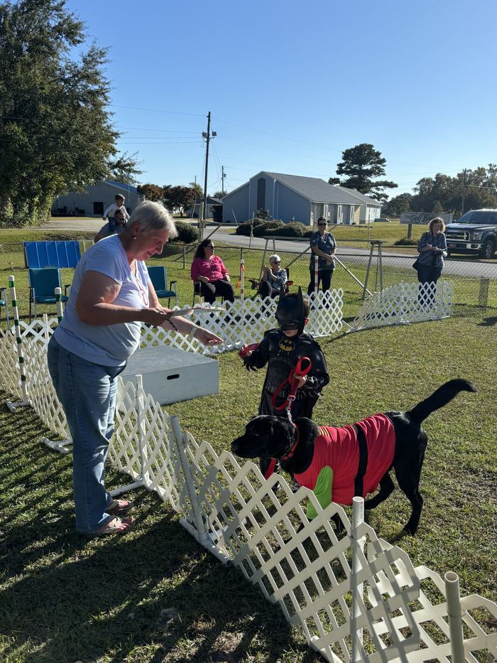 Luke Morris and his canine companion, Scout receiving their 2nd place ribbon