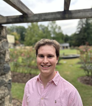 A man under a pergola.