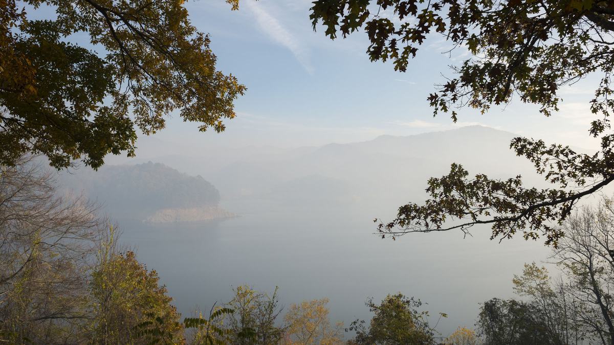 Smoke from forest fires in Western North Carolina obscures the view over the Smoky Mountains.