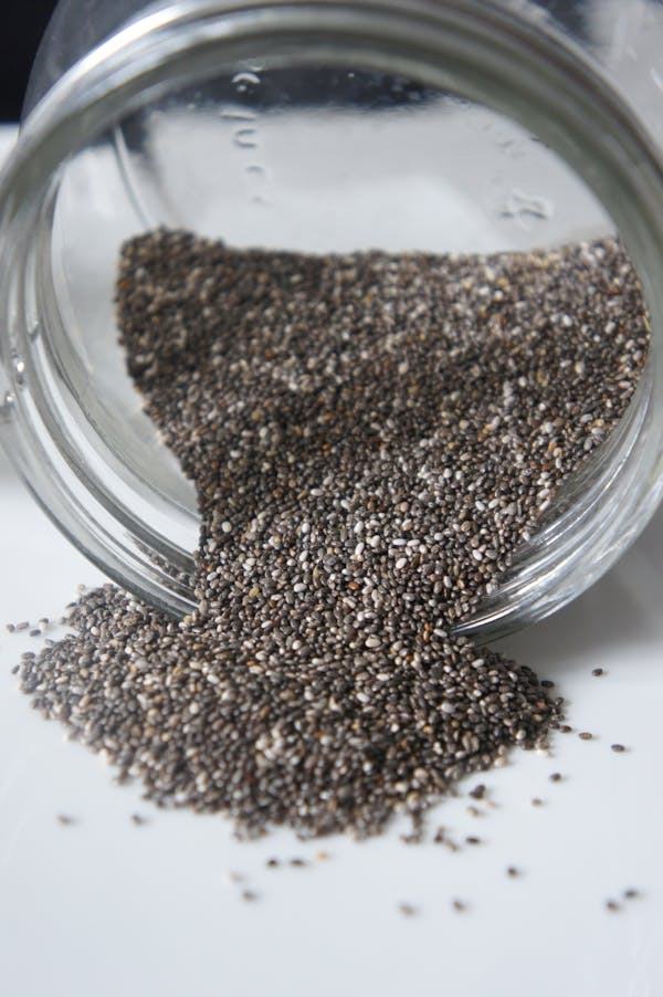 chia seed spilling out of a mason jar