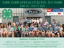 Group photo of youth in 4-H Camp rec hall.