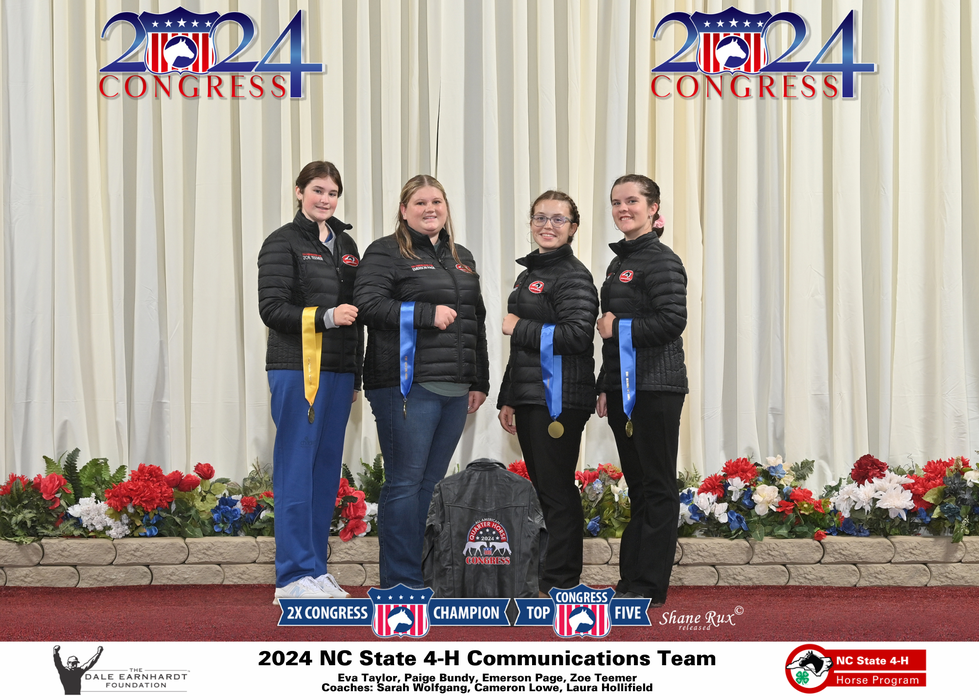 Four members of 2024 NC State 4-H Communications Team holding ribbons