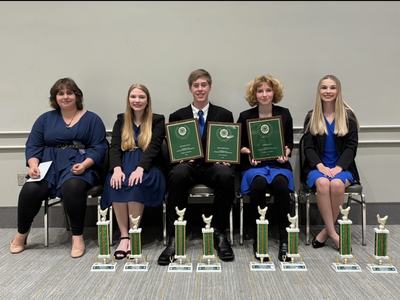 Team members with their awards