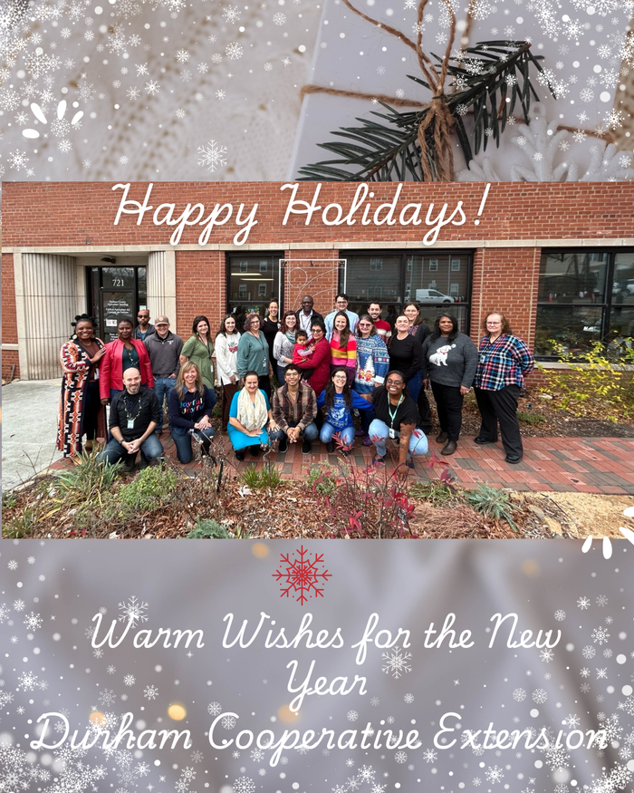 Durham Cooperative Extension staff posing outside; text: "Happy Holidays"