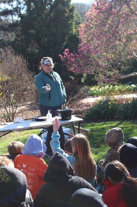 Instructor talking to students in outdoor lesson
