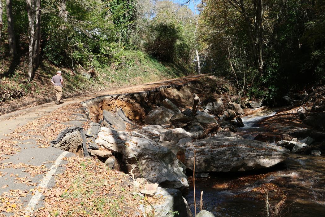 A road in Western North Carolina that has partially collapsed as a result of flooding after Hurricane Helene.