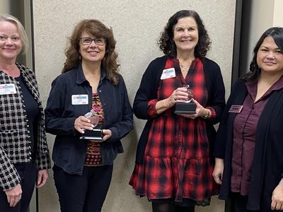 Rhonda and Seydel with awards