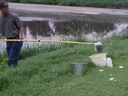 Collecting lagoon sample